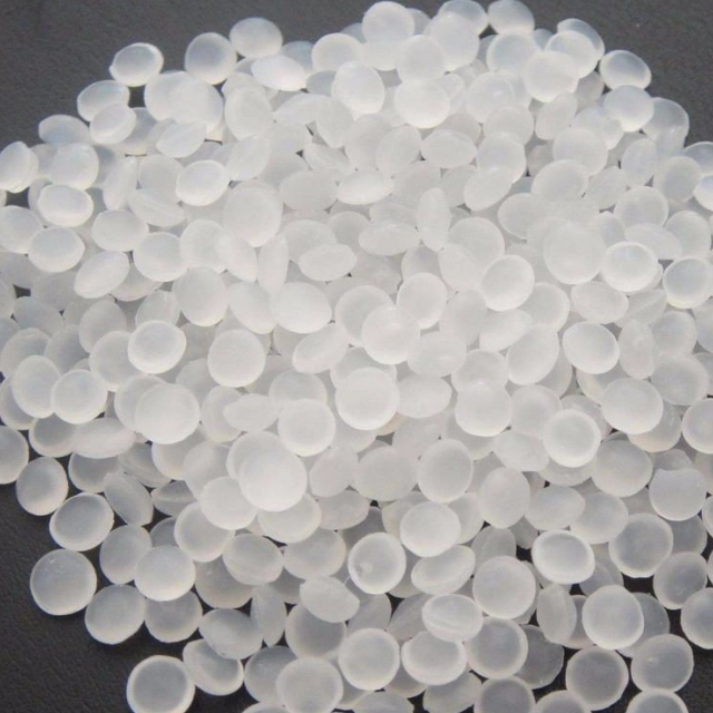 White plastic granules background